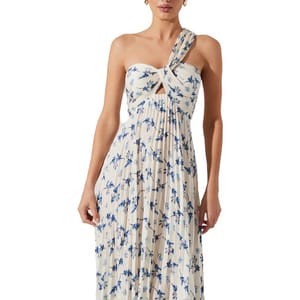 A white, one-shoulder floral dress featuring a blue pattern with a twisted knot design across the chest and a cut-out detail beneath.