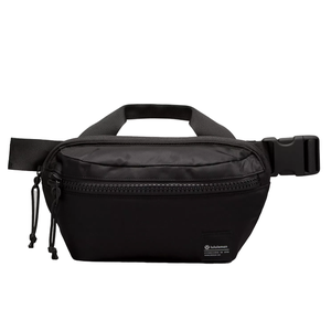 A black Lululemon belt bag featuring a main zippered compartment, adjustable strap, and buckle closure.