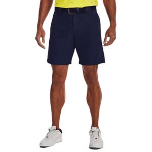 UA Golf Iso-Chill Airvent Shorts are navy blue, knee-length shorts designed to keep you cool with Iso-Chill fabric. They feature a flat front, belt loops, and are paired with white athletic shoes.