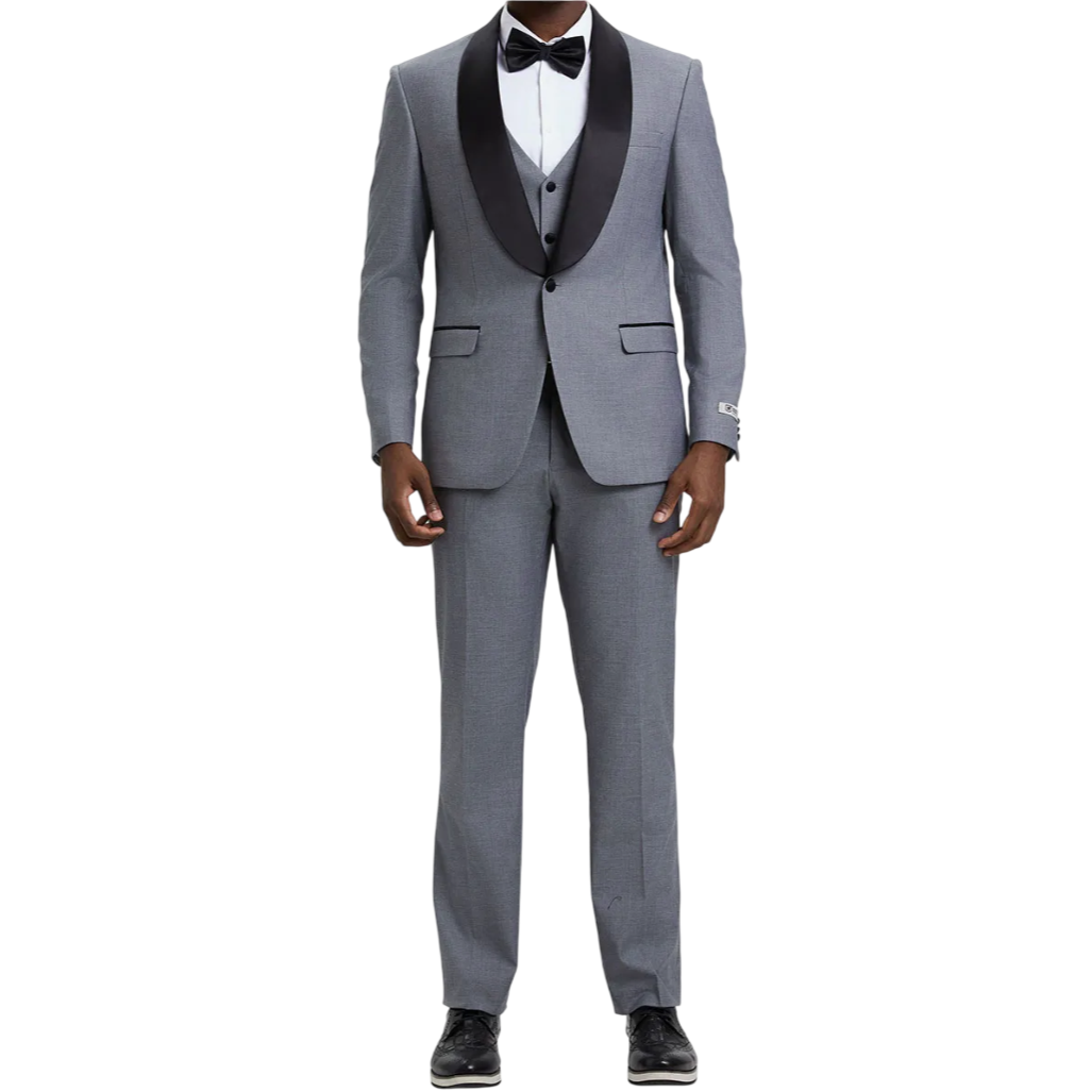 A grey suit features a shawl collar with black satin lapels, white dress shirt, black bow tie, and matching trousers, paired with black dress shoes.