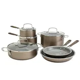 A cookware set featuring various pots and pans with lids, likely made of a metal material with non-stick interiors and glass lids.