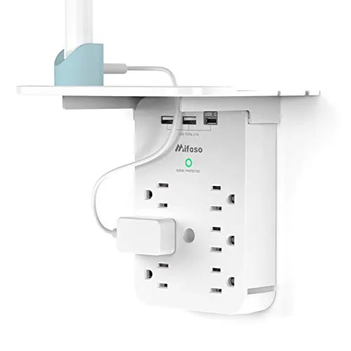 Wall-mounted power strip with multiple outlets and USB ports, featuring a small integrated shelf for organizing devices and cables.