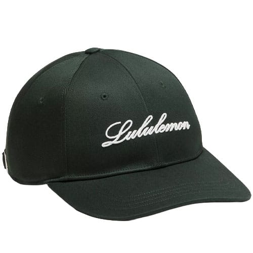 A dark green baseball cap featuring the white embroidered text \“Lululemon\“ on the front.