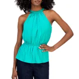 Sleeveless teal halter top with a gathered neckline and elastic waist, paired with dark jeans.