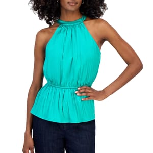 Sleeveless teal halter top with a gathered neckline and elastic waist, paired with dark jeans.
