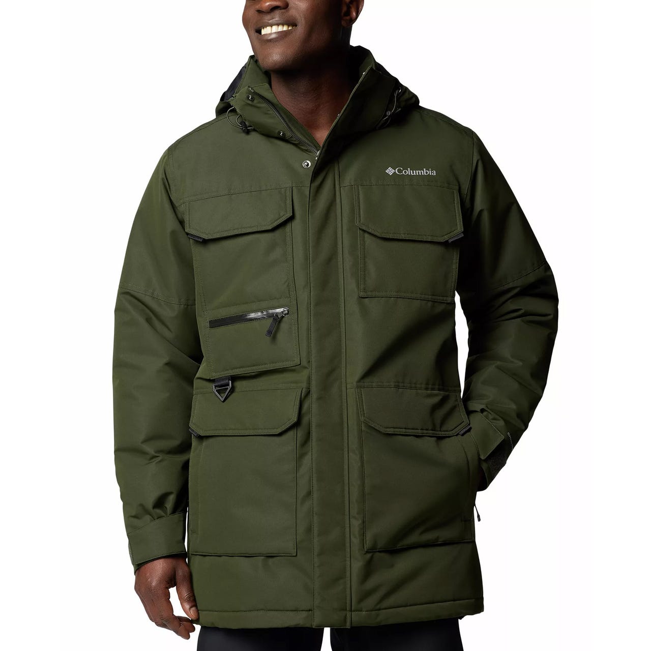 A green Columbia parka with multiple pockets, a zipper and snap button closure, and an attached hood.