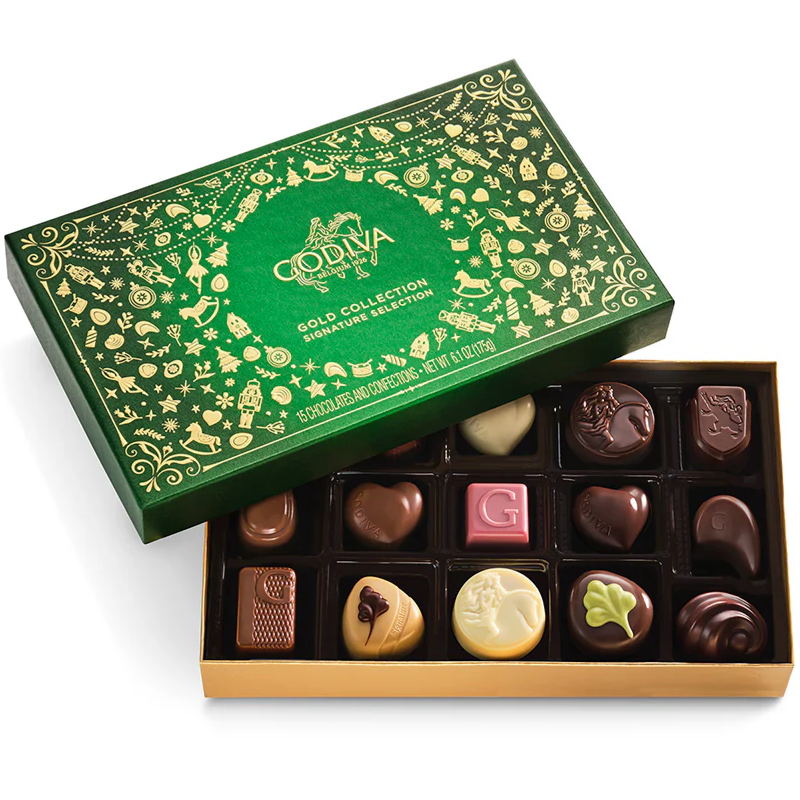 A box of Godiva Gold Collection chocolates featuring an assortment of variously shaped and colored chocolates, presented in an elegant green and gold packaging.