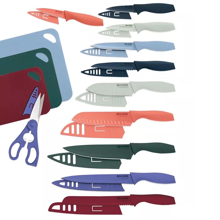 A set of colorful kitchen knives and three cutting boards in different colors.