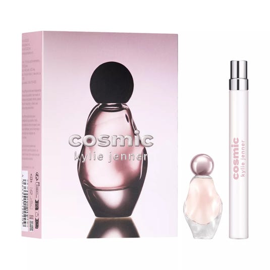 Cosmic by Kylie Jenner features a perfume set with a bottle and a travel-sized spray. The packaging is light pink with bold branding.