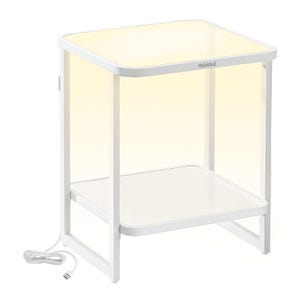 A white end table with a glass top and a lower shelf, featuring integrated LED lighting and a power cord for illumination.