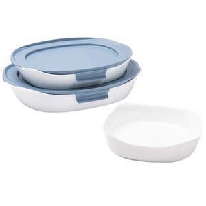 5-piece Rubbermaid Glass Bake Set includes two glass baking dishes with blue lids and one without a lid. The dishes are white with integrated handles for easy transport.