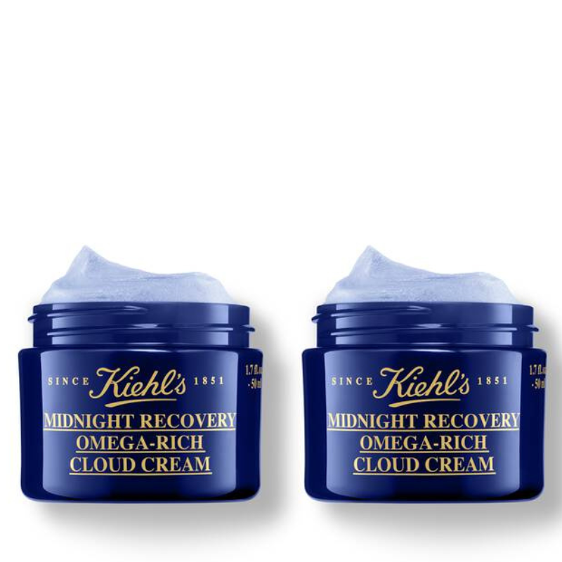 Kiehl's Midnight Recovery Omega-Rich Cloud Cream is presented in a deep blue jar with gold lettering, designed to hydrate and rejuvenate the skin overnight, available in a 1.7 fl. oz / 50 mL container.