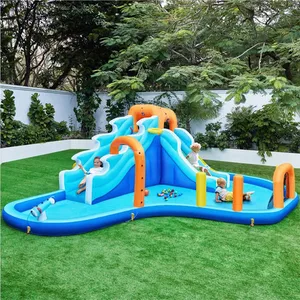 Inflatable water play structure with slides, splash pool, and climbing area, shown outdoors on grass with children playing.