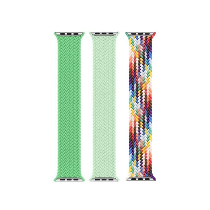 Three Apple Watch Braided Solo Loops are shown: two in shades of green and one multi-colored with a vibrant, woven pattern.