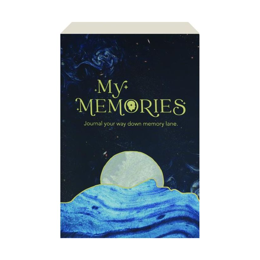 A journal titled \“My Memories\“ features a celestial-themed cover with a moonrise over blue waves and the tagline \“Journal your way down memory lane.\“