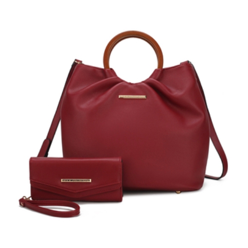 A red handbag with wooden handles and a matching red wallet featuring gold-tone accents and a detachable strap.