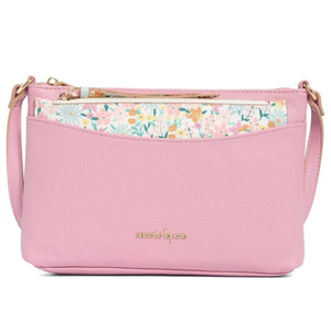 Pink crossbody bag with a textured finish, featuring a floral patterned zippered pocket and gold-tone branding.
