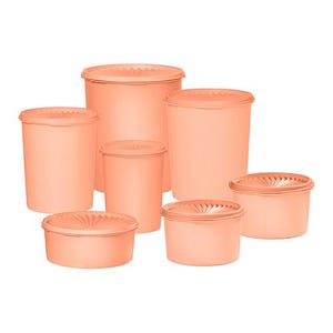 A set of six peach-colored cylindrical containers with lids, featuring a decorative sunburst pattern on top.