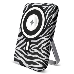 A zebra-patterned wireless charger with a stand and magnetic charging icon is shown.