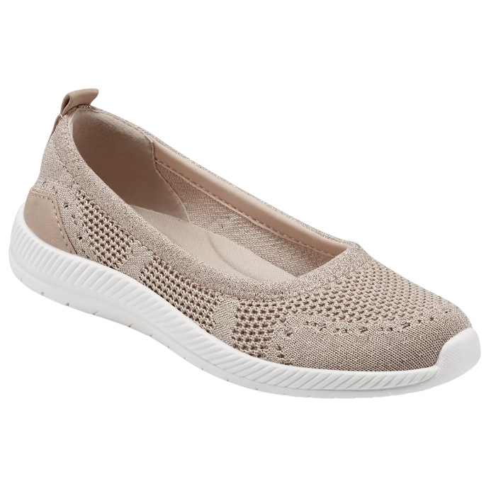 A beige knit slip-on shoe with a white, textured sole designed for casual wear. The shoe features a breathable, stretchable upper and a flat heel, ideal for comfort and everyday use.
