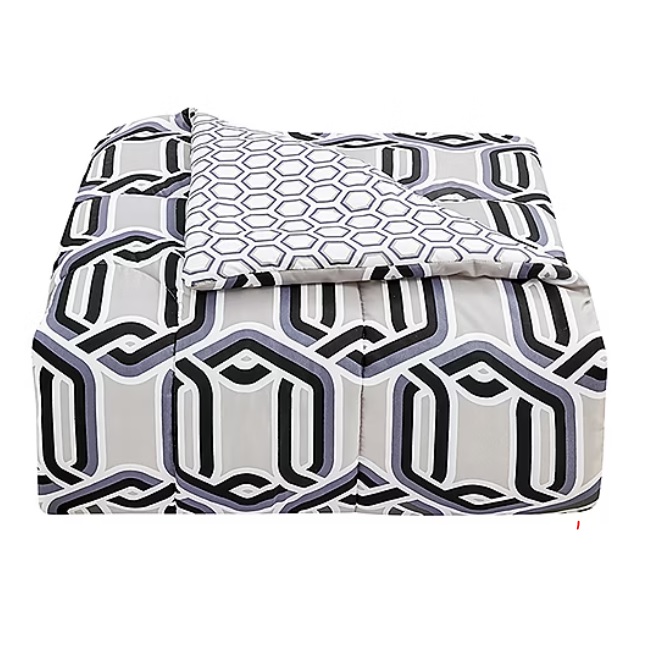 A modern geometric-patterned comforter set in shades of gray, black, and white, featuring a reversible design with different patterns on each side.