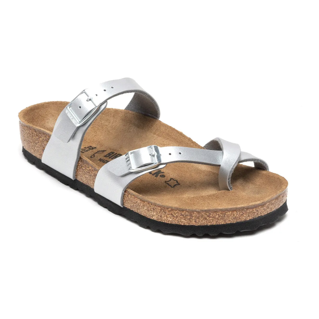 Silver Birkenstock Sydney Graceful Sandals feature two adjustable straps with metallic buckles and a contoured cork footbed.