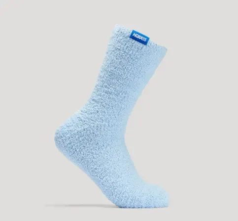 A single light blue, fluffy sock with a visible brand label.