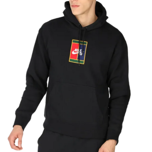 A person is wearing a black Nike SB hoodie featuring a multicolored rectangular logo on the front.