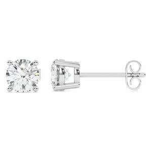 A pair of stud earrings featuring round-cut clear gemstones set in a four-prong metal setting with a straight post and butterfly back closure.
