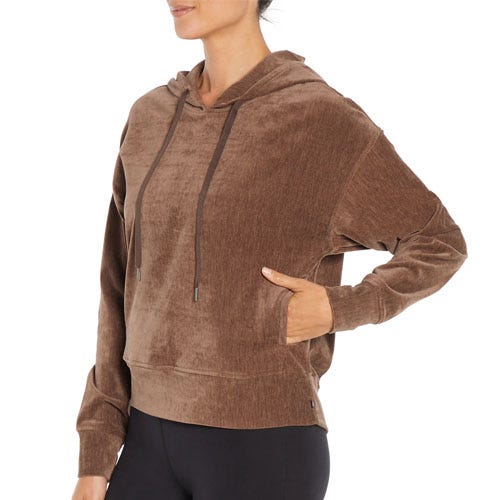 Brown velour hoodie with drawstrings, worn by a person paired with black leggings.
