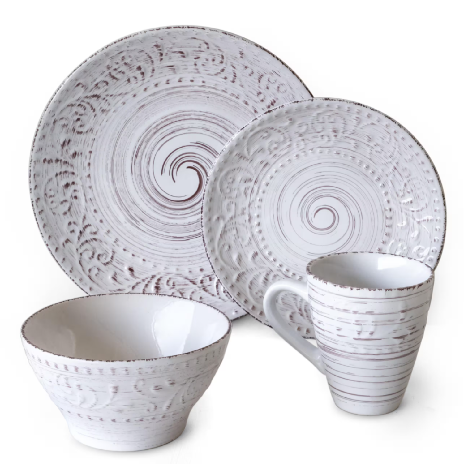 A 16-piece dinnerware set featuring a white glaze with embossed circular patterns, including dinner plates, salad plates, bowls, and mugs.