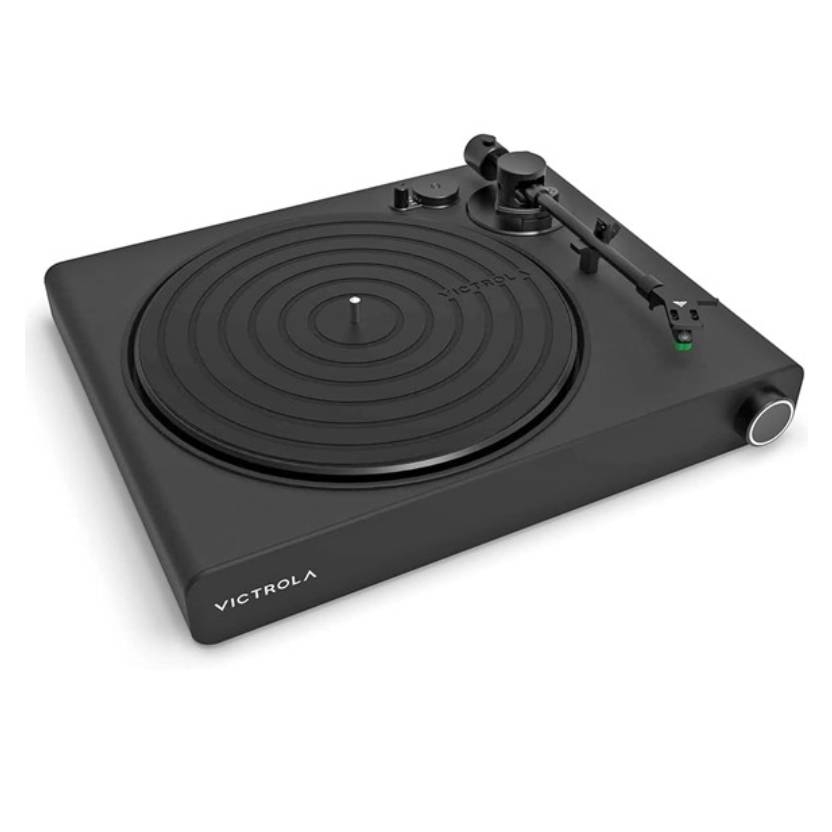 Victrola Stream Onyx Turntable is a sleek, modern record player with a minimalistic black design, featuring a circular platform, tonearm, and control knobs. It integrates seamlessly with wireless audio systems for easy listening.