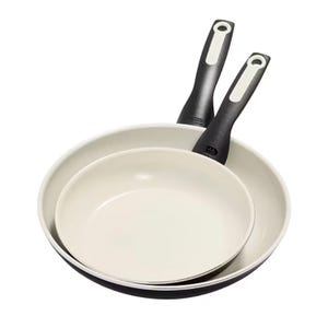 The GreenPan 2pc Ceramic Frypan Set features two frying pans with ceramic non-stick coating and black handles, ideal for various cooking needs.