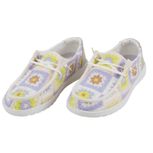 Casual slip-on shoes with a colorful crochet pattern featuring pastel purple, yellow, and cream hues, designed with white soles and laces.