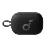 A compact, portable Bluetooth speaker with a fabric exterior, featuring a strap for easy carrying. It has control buttons on top, including power, volume, and play/pause options, and displays a lowercase \“d\“ logo.