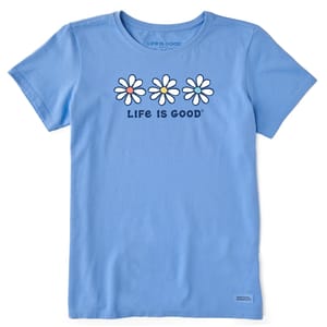 Light blue T-shirt featuring three daisy graphics with colored centers and the text \“Life is Good\“ beneath them.