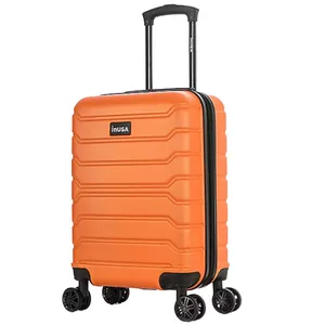 An orange carry-on suitcase with four spinner wheels, a telescopic handle, and a ribbed exterior design.