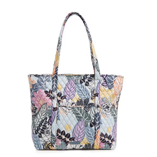 Patterned tote bag with multiple colors and leaf design.
