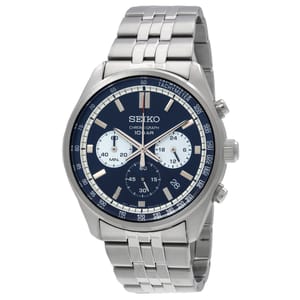 Seiko Men's Chronograph Watch features a blue dial with silver-tone indices, three subdials for measuring time, a date window, a tachymeter scale, and a stainless steel bracelet. Water resistance is up to 10 bar.