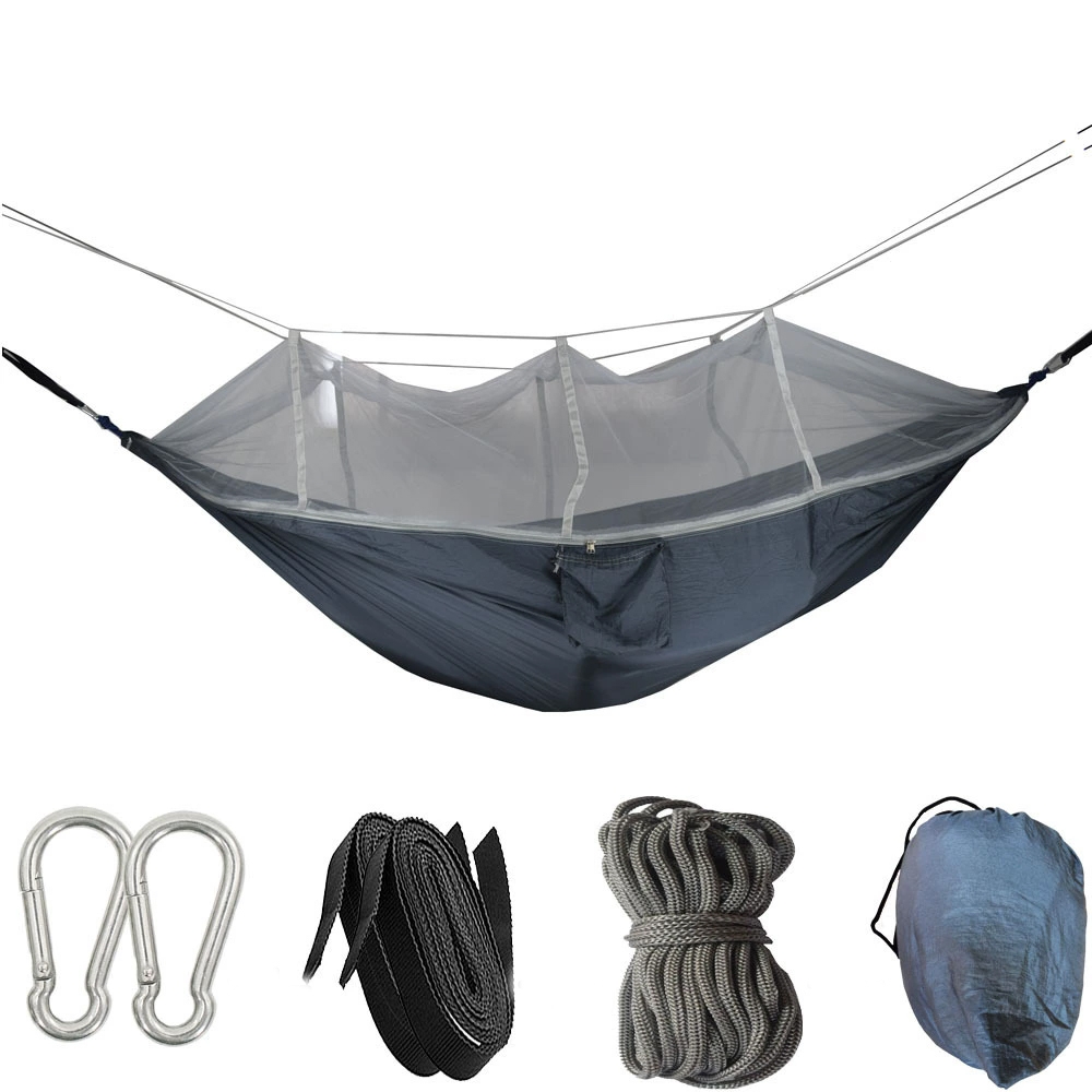 Camping hammock with mosquito net, includes carabiners, straps, rope, and a storage bag.