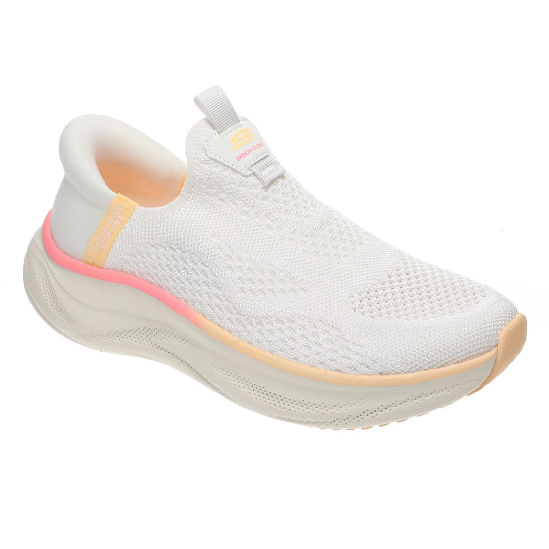 A white slip-on athletic shoe with a mesh upper, featuring peach and pink accents and a cushioned sole, branded with \“Skechers\“.