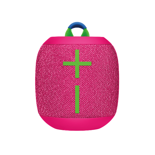 The Wonderboom 3 Speaker is a portable Bluetooth speaker in pink with a woven texture, featuring prominent green plus and minus symbols for volume control. It includes a blue and green loop handle for easy carrying.