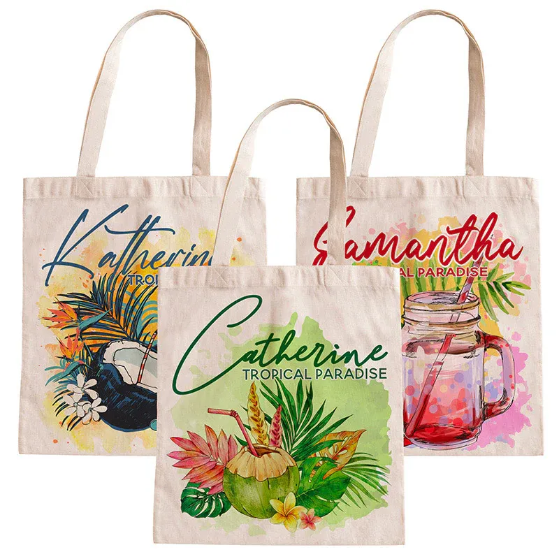 Three tote bags feature colorful tropical designs with names \“Catherine\“ and \“Samantha.\“ Each bag showcases vibrant elements like palm leaves, coconuts, and a jar drink with straws, accompanied by the text \“Tropical Paradise.\“