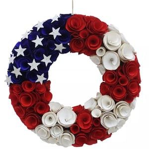 Patriotic wreath featuring red, white, and blue paper roses with white stars, designed to resemble the American flag.