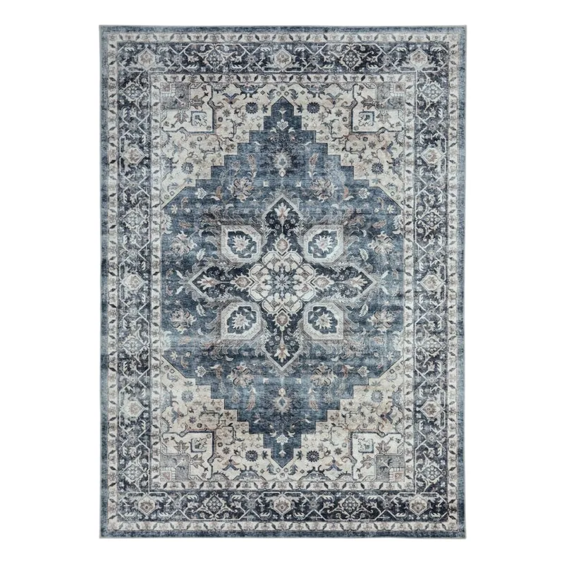 A rectangular area rug with a distressed vintage design, featuring intricate floral and geometric patterns in shades of blue, cream, and gray.