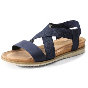 Navy blue sandal with crisscross fabric straps, padded footbed, cork midsole, and a textured, beige rubber outsole.