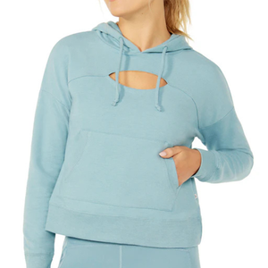 Light blue cropped hoodie with a cutout design, drawstring hood, and a front kangaroo pocket.