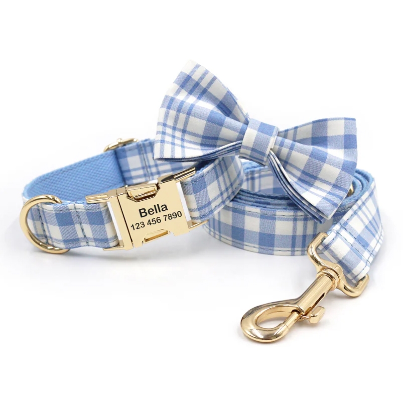 Blue and white checkered pet collar and leash set with a matching bow tie, featuring a gold nameplate engraved with \“Bella\“ and a phone number.