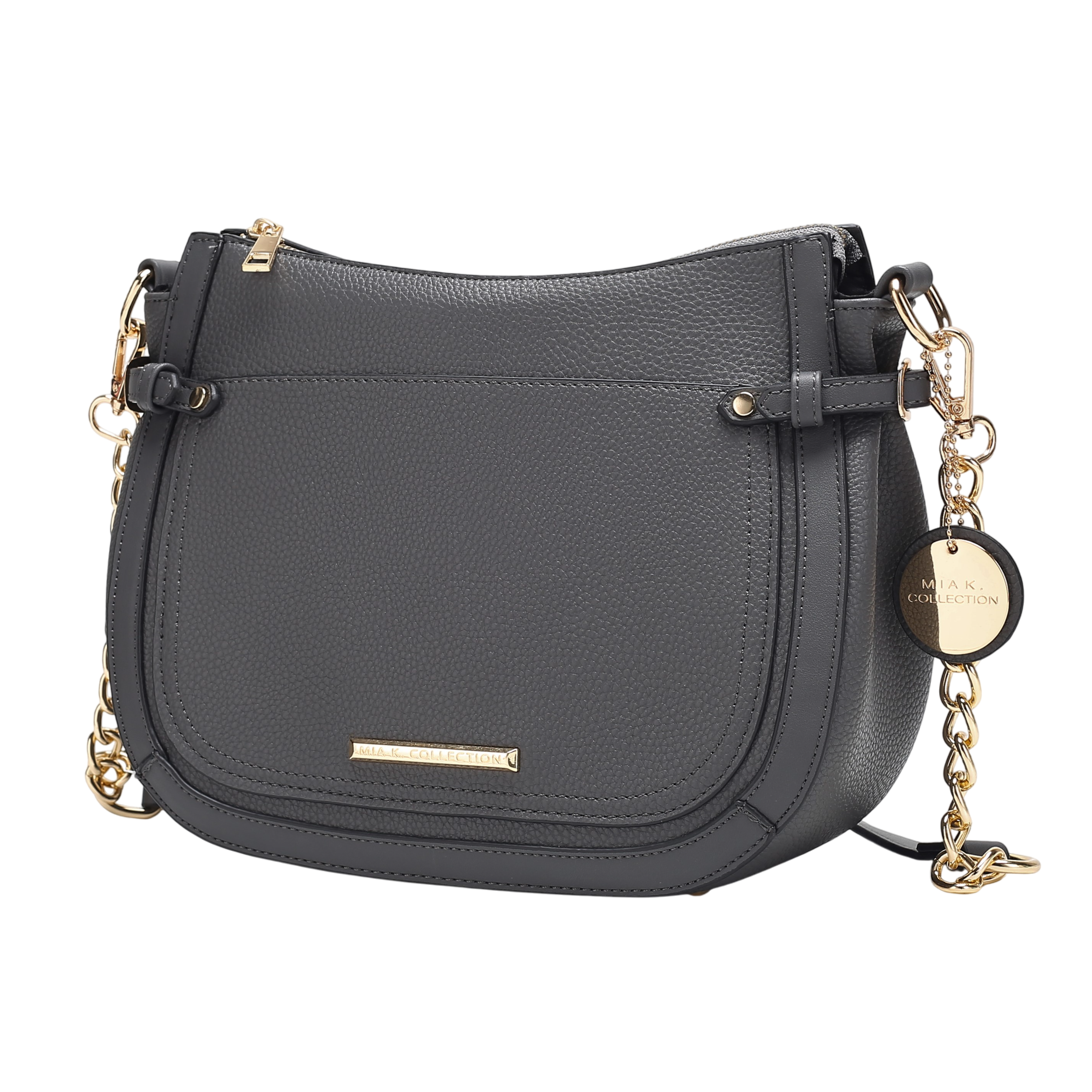 A gray textured leather handbag with gold-tone hardware and chain accents, featuring a circular tag that reads \“MILA K. COLLECTION.\“