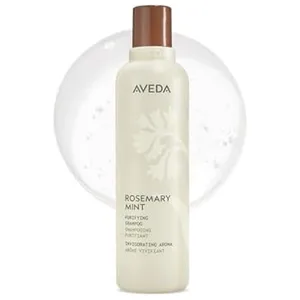 Aveda Rosemary Mint Purifying Shampoo features an invigorating aroma and is designed to purify hair.